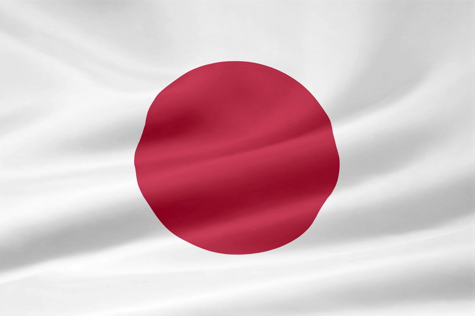 Die Flagge Japans zeigt einen roten Kreis auf weißem Hintergrund, der die Sonne symbolisiert.