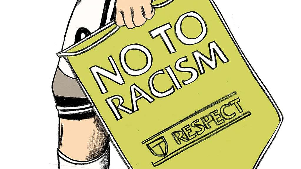 Grafik: ein Fußballspieler trägt einen Wimpel mit der Aufschrift "No to racism"